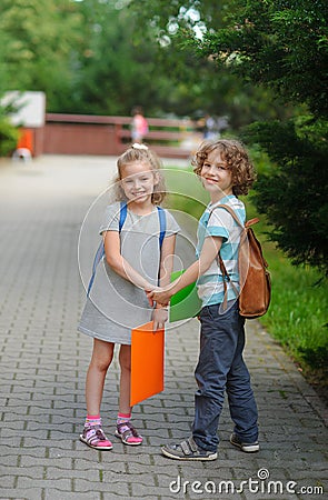 Boy and girl - pupils of elementary school. Stock Photo