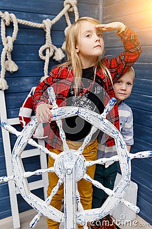 Boy , girl in sea helm Stock Photo