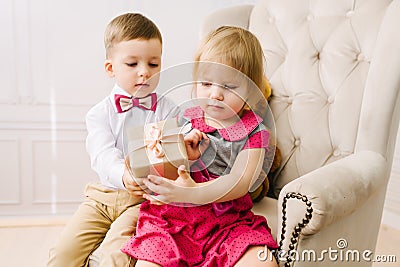 Boy gives a girl gift Stock Photo