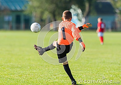 Boy goalkeeper defends the goal Stock Photo