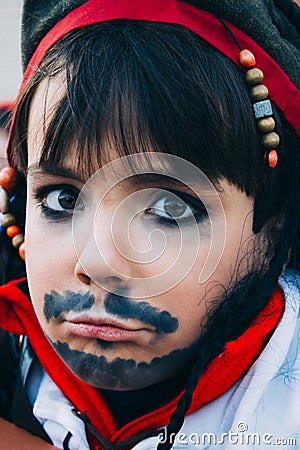 Boy with green eyes pirate Stock Photo
