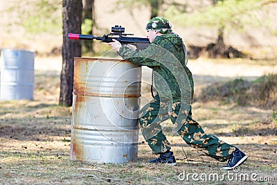 Boy with a gun playing lazer tag Stock Photo