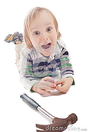 Boy with hammer and pliers Stock Photo