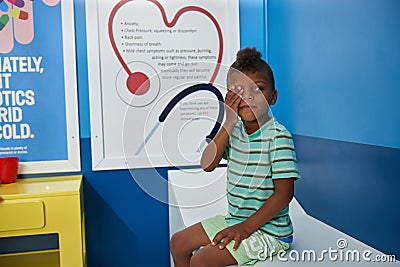 Boy having test at ophthalmologist office. Stock Photo