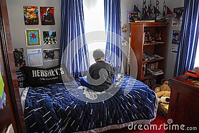 Boy in His Room Editorial Stock Photo