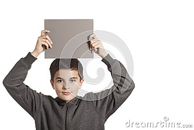 Boy holding a gray card Stock Photo