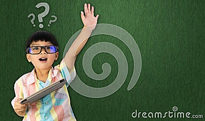 Boy holding tablet raise his hand up for question Stock Photo