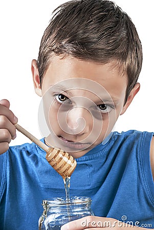 Boy and honey Stock Photo