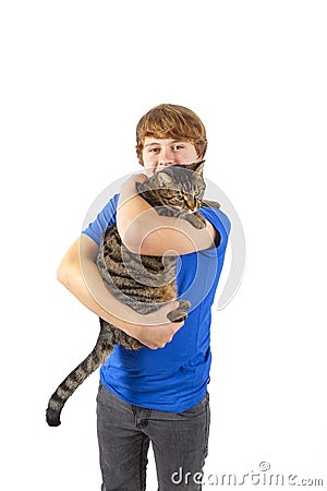Boy hugging with his cat Stock Photo