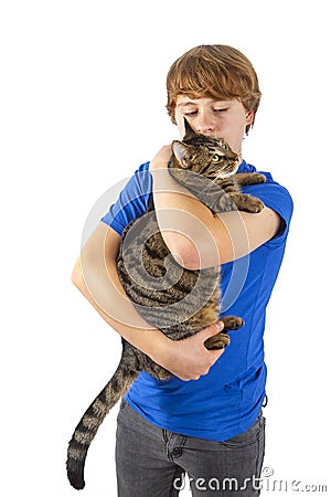 Boy hugging with his cat Stock Photo