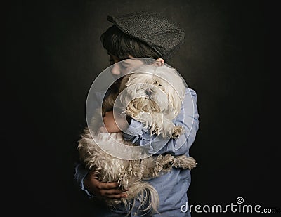 Boy hugging his dog Stock Photo