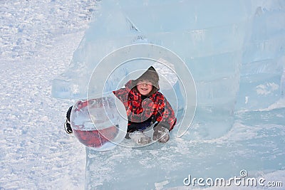 Boy in ice sculpture, urban esplanad Stock Photo