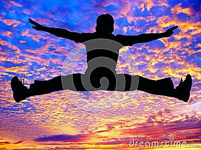 Boy jumping high in the air Stock Photo