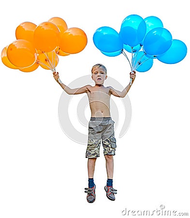 Boy jumping holding a bunch of balloons, orange and blue Stock Photo