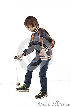 Boy with kendama Stock Photo