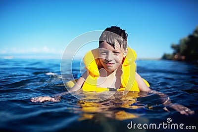 Boy in the life-vest Stock Photo