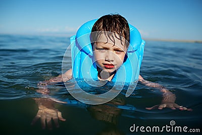 Boy in the life-vest Stock Photo