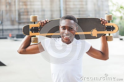 Boy with Longboard Stock Photo