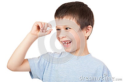 Boy looks at lost tooth Stock Photo