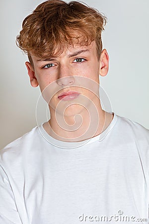 Boy male teen teenager young adult looking sad, thoughtful or depressed Stock Photo