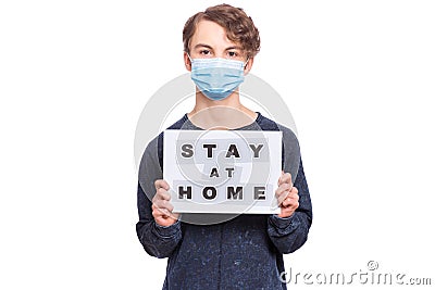 Boy in mask stay home Stock Photo