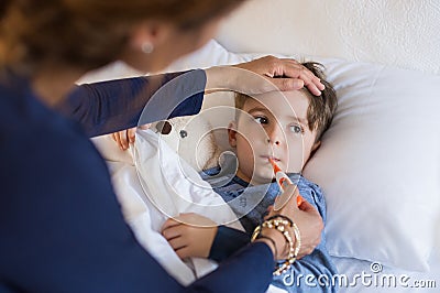 Boy measuring fever Stock Photo