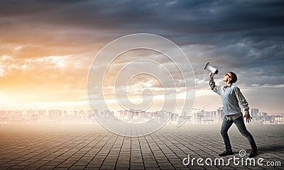 Boy with megaphone Stock Photo