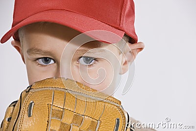 Boy with Mitt and Baseball Cap Stock Photo