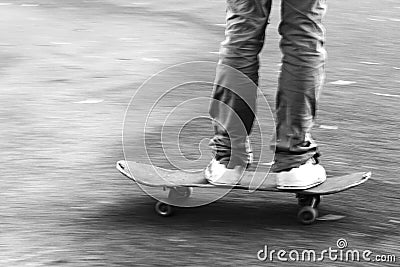Boy on the move on the skateboard Stock Photo