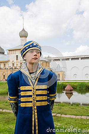 Boy in national russian suit on the Kremlin Rostov Great Stock Photo