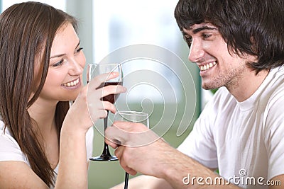 Boy with nice girl with wineglasses Stock Photo