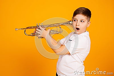 The boy overhears through the pipe. I want to hear everything Stock Photo