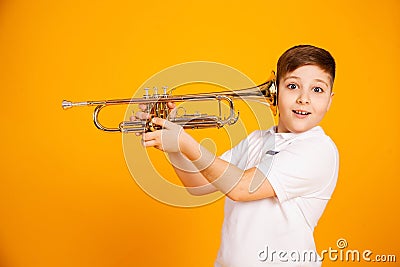 The boy overhears through the pipe. I want to hear everything. Stock Photo