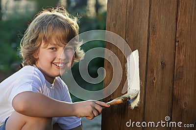 Boy with paint brush Stock Photo