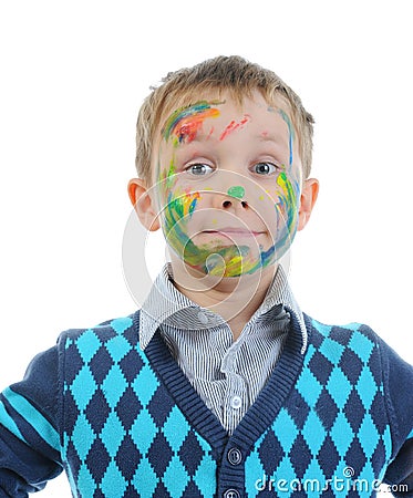 Boy with paint stained face Stock Photo