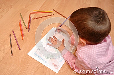 Boy is painting the picture Stock Photo
