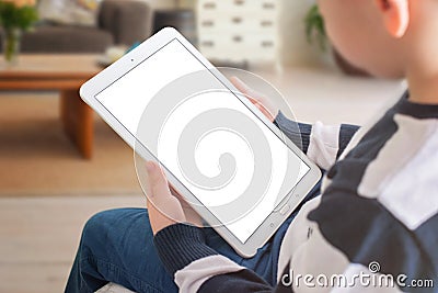 Boy play game or learn online with tablet. App, web site design presentation, mockup concept Stock Photo