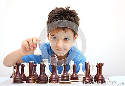 A boy playing chess Stock Photo