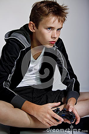 Boy playing computer game Stock Photo