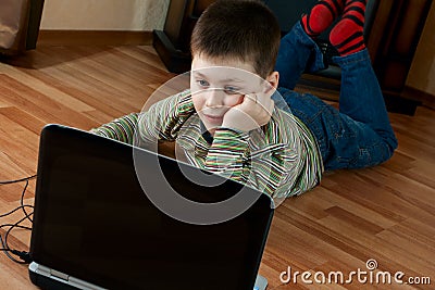 Boy playing computer game Stock Photo