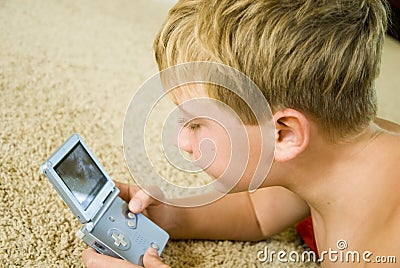 Boy Playing a Computer Game Stock Photo