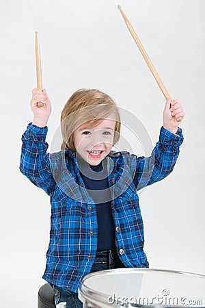 Boy playing drums Stock Photo