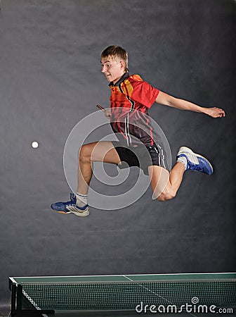 Boy playing ping pong Stock Photo