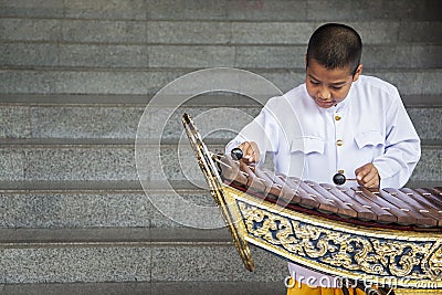 Boy playing xylophone in Bangkok, Thailand Editorial Stock Photo