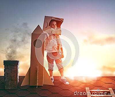 Boy plays astronaut Stock Photo