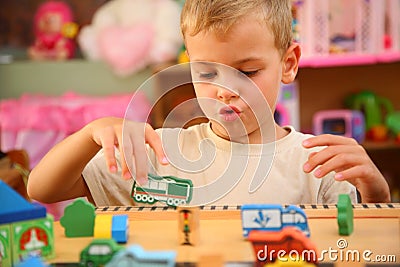Boy plays in playroom Stock Photo