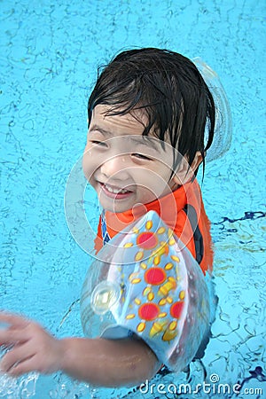 Boy in the pool Stock Photo