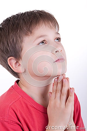 The boy prays Stock Photo