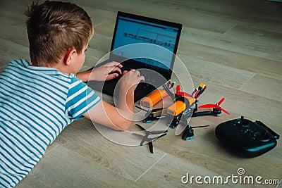 Boy programming drone, STEM education. Learning modern technology Stock Photo