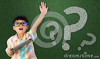 Boy raise his hand to ask question Stock Photo